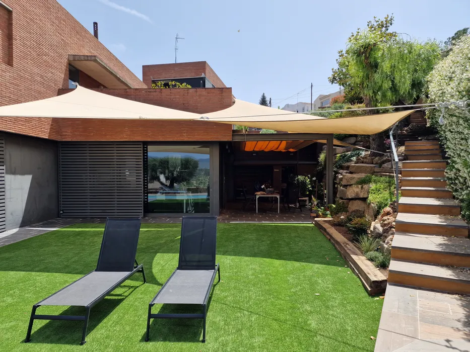Cover for Reforma jardí – Casa unifamiliar